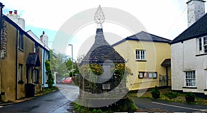 DenburyÂ is a village inÂ Teignbridge district ofÂ Devon , England.